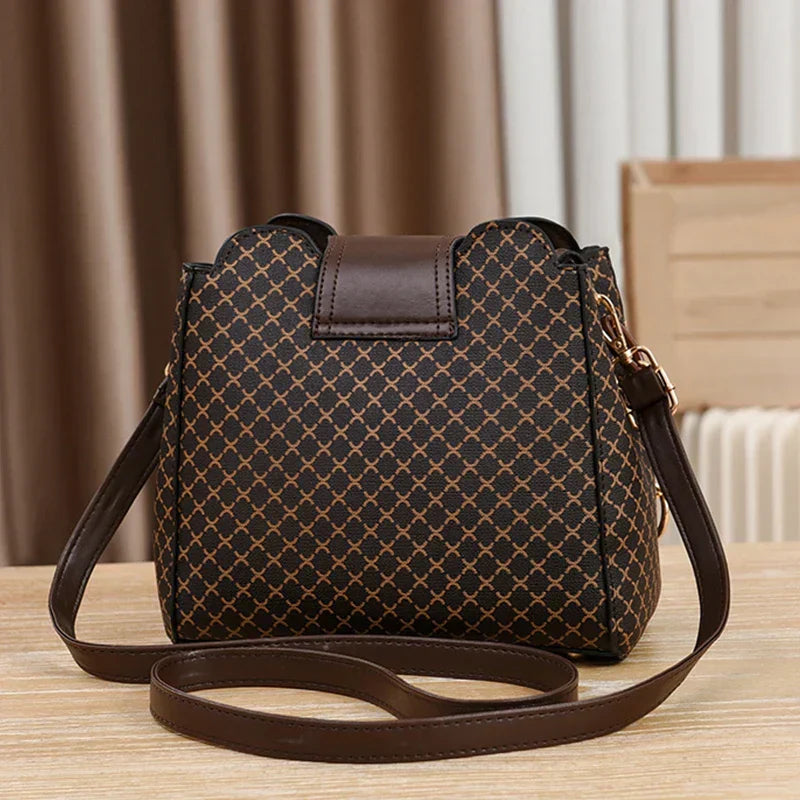 KATÉLISE CHARM BAG